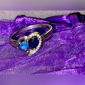 EUC Marked S925 Silver Ring with Faux Diamonds and Blue Stones. Size 8 3/4.